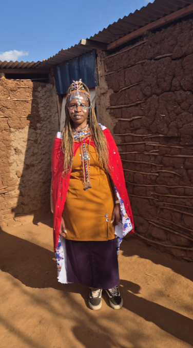 Mary Chege in Maasai costume