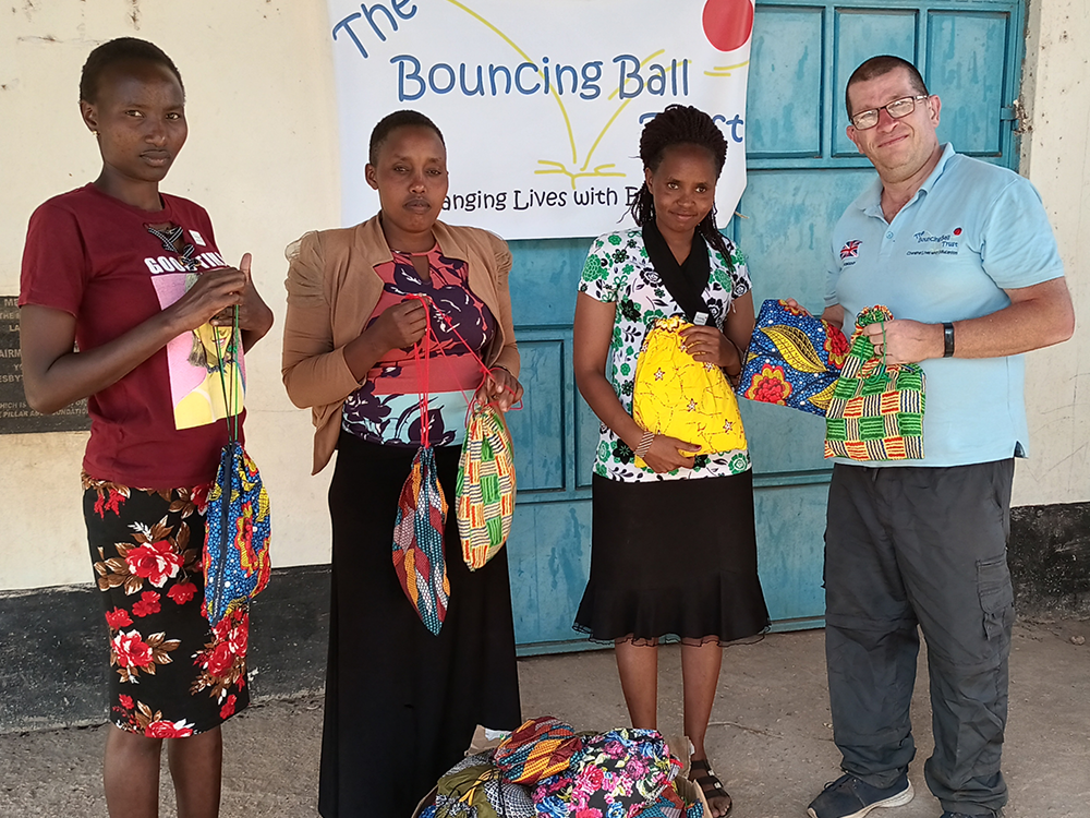 handing over the sanitary carry bags